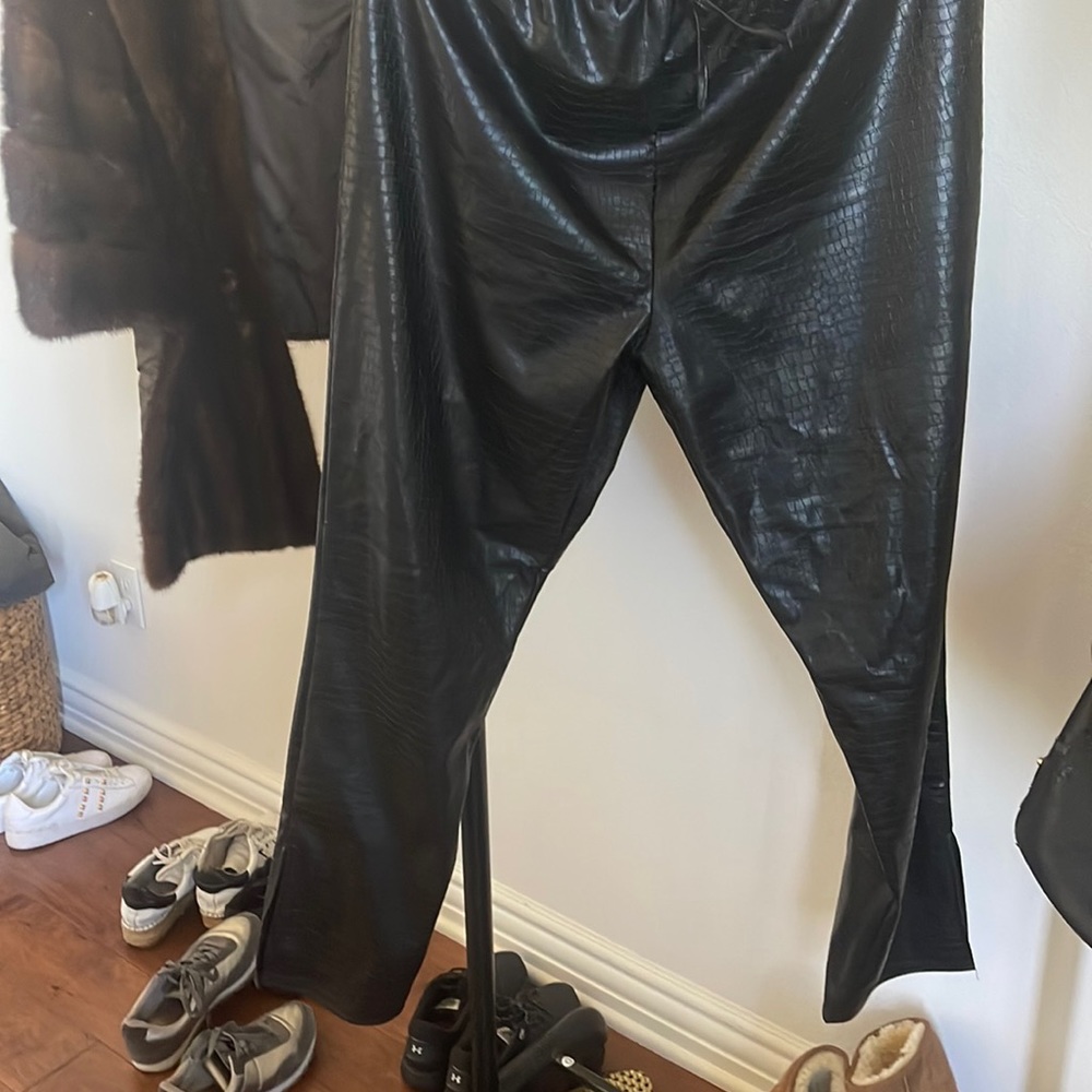 Black faux leather pants with stretch